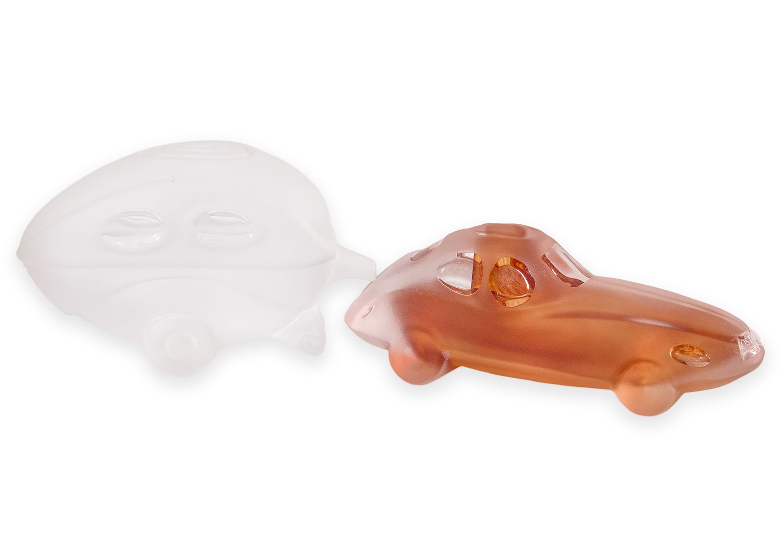 Olle Brozen for Kosta Boda Sweden Car-toon Series 2003/2004 Signed Art Glass Sculpture: A whimsical pair of art glass sculptures from the Car-toon series designed by Olle Brozen for Kosta Boda, Sweden. Each piece is signed and marked for Kosta Boda, retaining original labeling. Created i