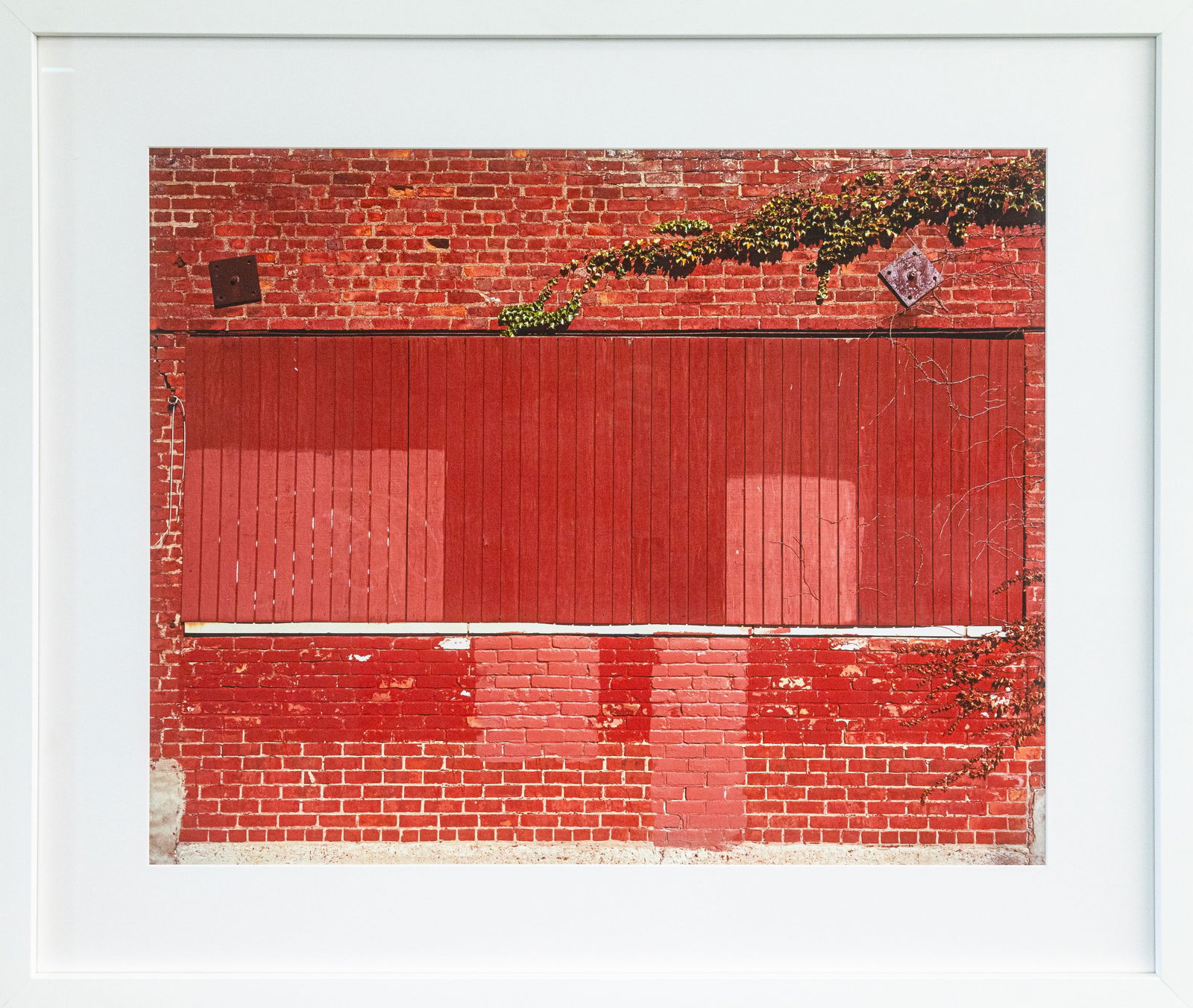 Eleanor Oakes, Atwater at Chene September, 2015, Photograph on Archival Paper: A color photograph on archival paper titled “Atwater at Chene September (2015)” by Eleanor Oakes. The photo captures a carefully observed urban façade composed of layered brickwork an