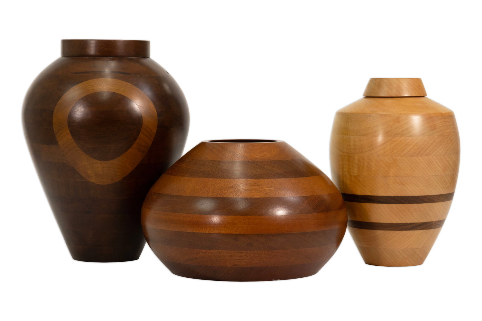 Robert St. Pierre - Signed Turned Wood Vessel Collection (1003 / 1064 / 1126) Modern Design: Collection of three signed turned wood vessels by Robert St. Pierre, executed in richly figured exotic hardwoods including mahogany, maple-padouk, and imbuya. Signed and numbered on the underside. Eac