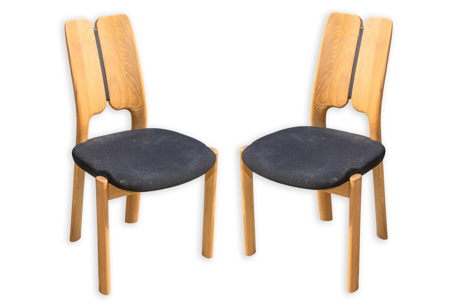 Ronnum Pair of Teak Chairs Danish Scandinavian Mid-Century Modern Design: Pair of Ronnum teak chairs in the Danish modern style, combining sculptural woodwork with practical dining or side chair functionality. Each chair features a solid teak frame with rounded legs, a shap