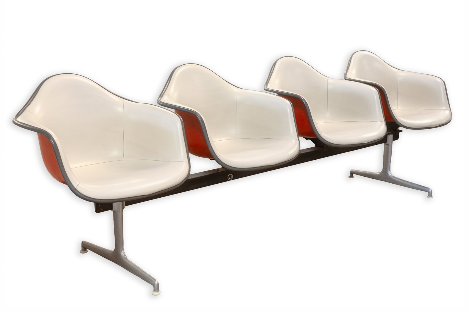 Charles & Ray Eames for Herman Miller - Tandem 4 Seat Fiberglass Shell Chair Bench: A vintage Charles & Ray Eames for Herman Miller 4 seat tandem shell chair bench. This is a very rare tandem bench from Herman Miller. This particular model features a four seat design, featuring the i