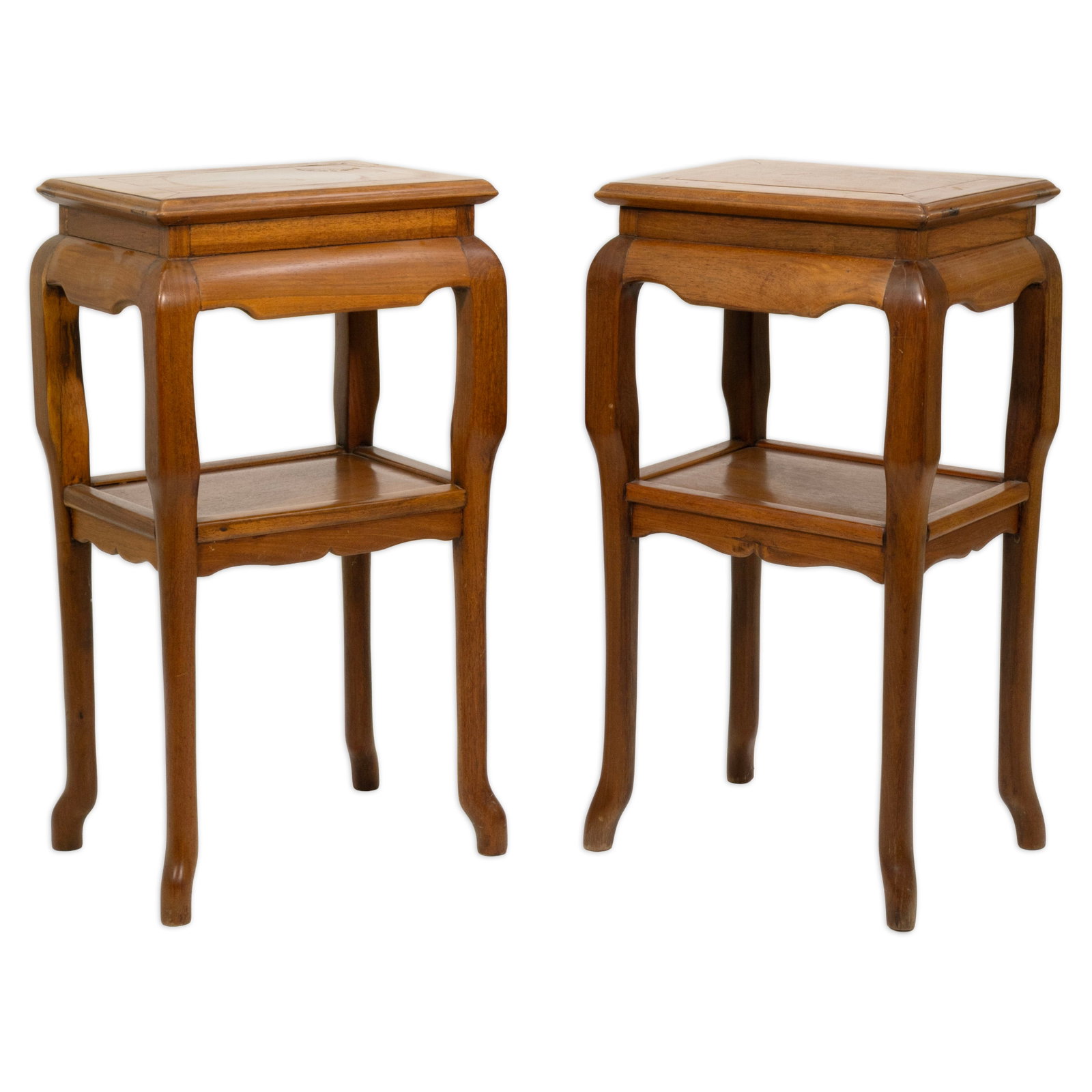 Chinese Huanghuali Hardwood Side Tables Asian Decorative Furniture: A pair of Chinese side tables executed in richly figured huanghuali hardwood with refined traditional joinery and softly curved legs. Each table features a rectangular top above a shaped apron with op