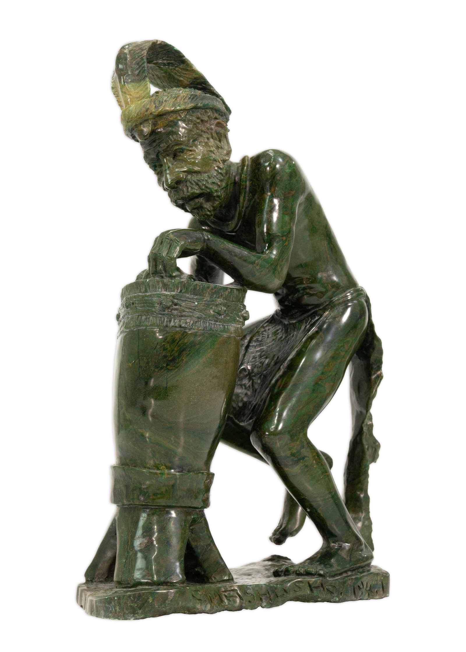 African Verdite Stone Tribal Figure with Drum Hand-Carved Sculpture Signed: Hand-carved African tribal figure sculpture executed in richly veined green verdite stone, depicting a seated male drummer wearing a feathered headdress and traditional garment. Signed along the base.