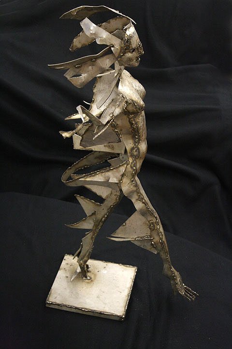 "War Victim" Stainless Steel Sculpture by Marian: by Marian Owcarski 1932-2010 Freestanding Stainless Steel sculpture, 31 x 22 x 16 inJosef Stalin, the Soviet nemesis of Marian Owczarski, was known as the 'man of steel'. In actuality, it's Owczarski,