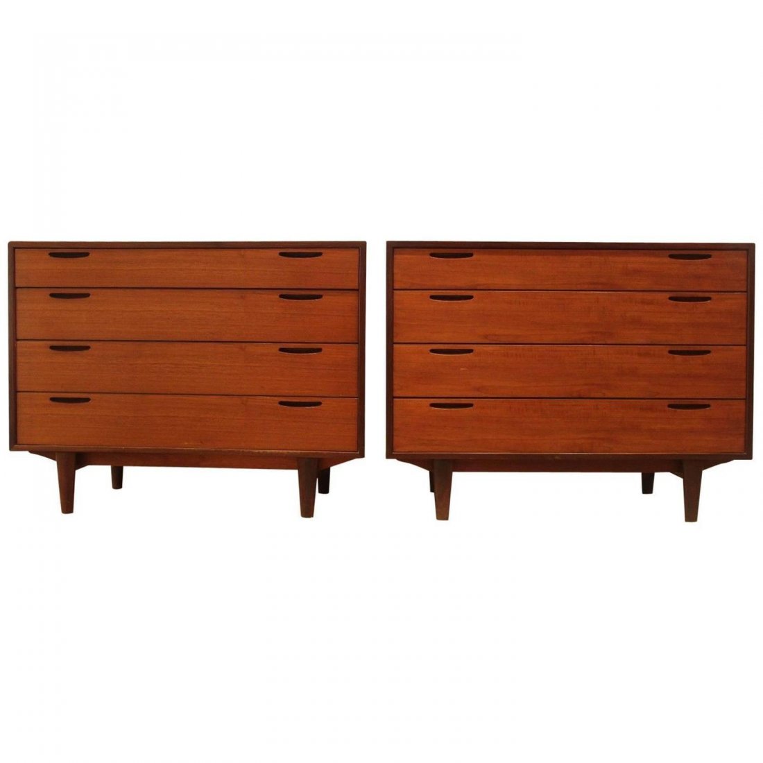 Pair of Danish Teak and Rosewood Dressers by Ib Kofod: This pair of dressers are attributed to Ib Kofod-Larsen for Clausen, Denmark, circa 1950s. The upper drawer on one has an fold down mirror and compartmentalized space for jewelry, watches, etc. 30.25"
