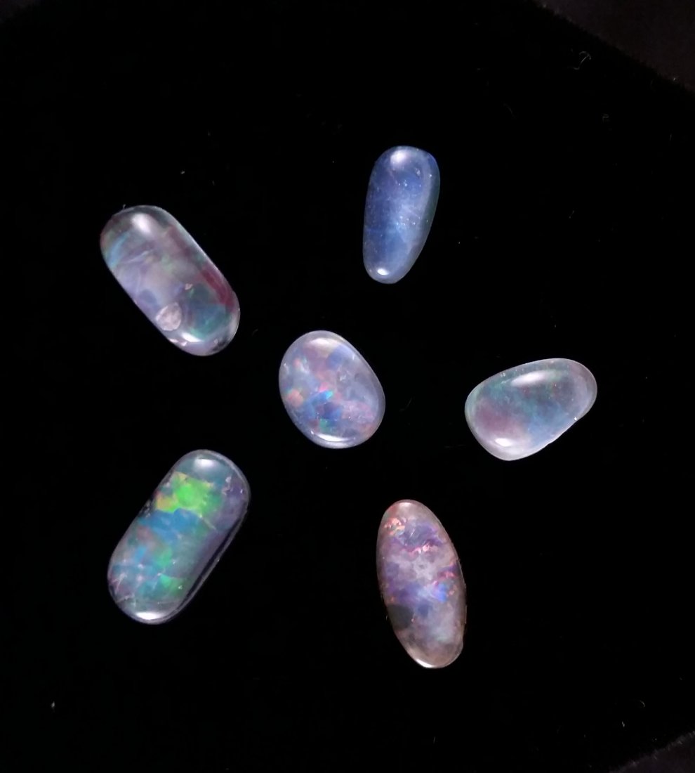 Australian Fire Opal (23) Carats: Very nice Australian Fire Opal lot 6 stones DUBLETS weighing 23 Carats. Found in old time estate. The man lived and worked the mines in Australia brought them to the Sierra Mountains and polished the 