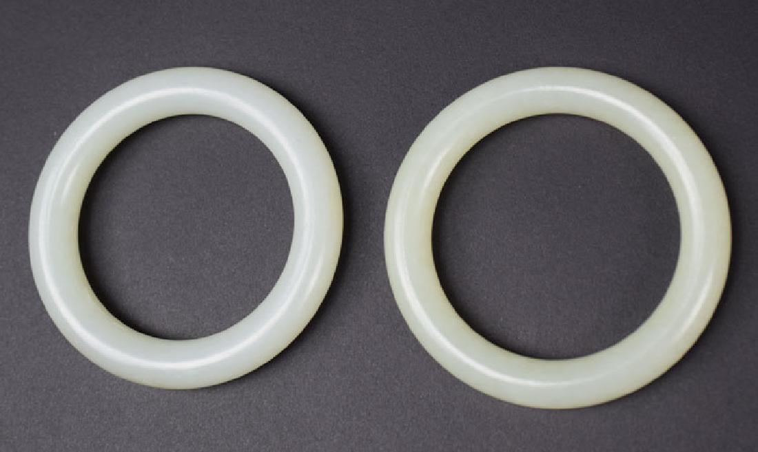 Pr. Chinese carved white jade bangles (1 of 3)