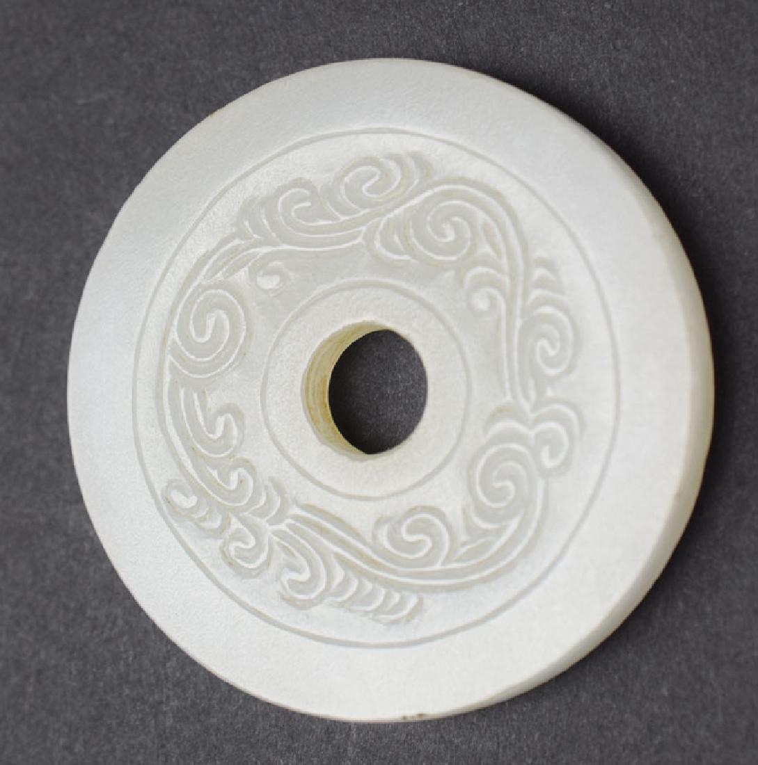 Chinese carved white jade Bi disk (1 of 3)