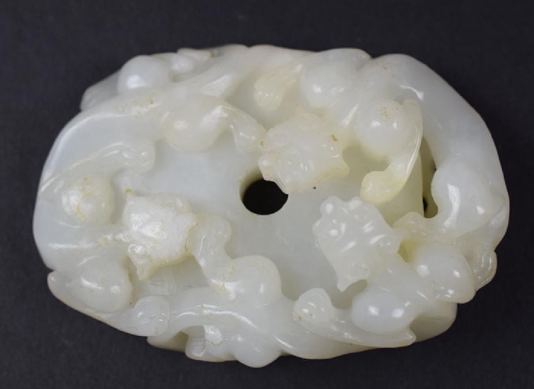 Chinese carved white jade toggle (1 of 2)