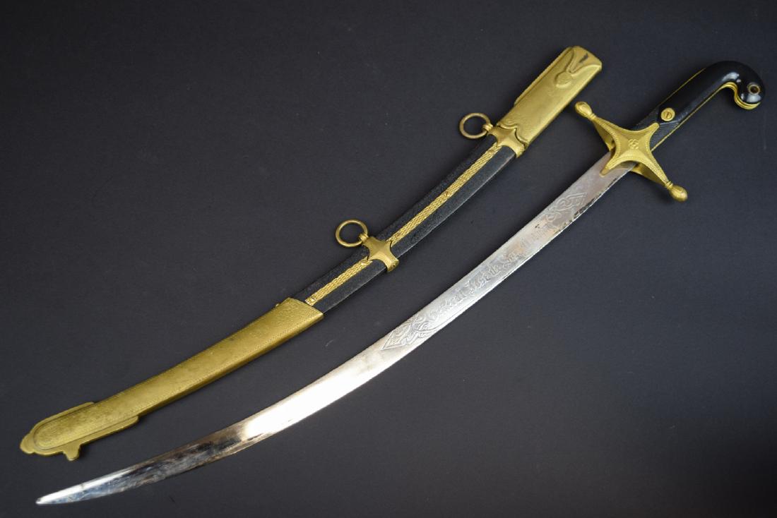 Argentina Academy Cadet Officer Sword: Argentina Academy Cadet Officer Sword. Curved inscribed blade bearing "General Jose de San Martin". 23" total length, 17.25" length of the blade.