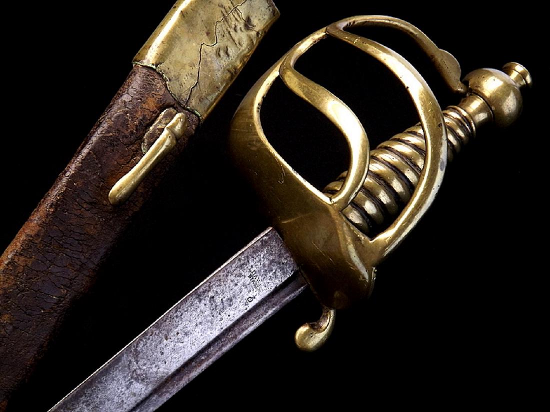 American Revolution era English Infantry Hanger Sword: American Revolution era English Infantry Hanger Sword Maker marked, with Orig. Scabbard. Solid brass hilt mounts with fluted grip and heart shaped clam shell guard. Lightly curved blade with narrow sp