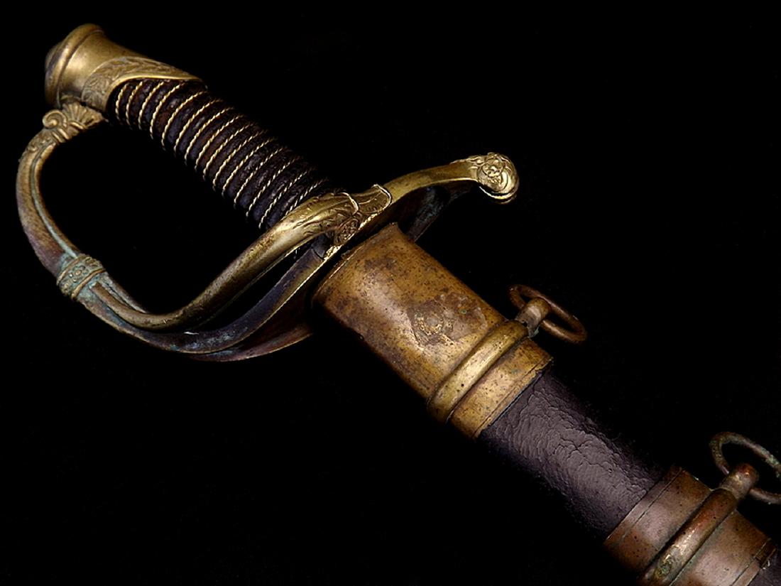 Scarce Pre American Civil War era US Infantry Officers: Scarce Pre American Civil War era US Infantry Officers SwordIn its brass mounts with double branch guard having foliage decorations, original leather and wire bound grip. Curved large fullered blade w
