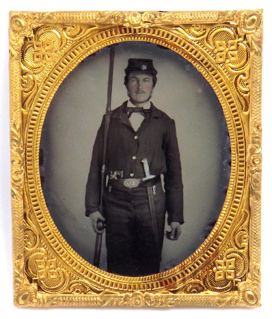 1/6 plate Ruby Ambrotype of a Civil War Soldier Armed: 1/6 plate Ruby Ambrotype of a Civil War Soldier Armed with a Rifle, Bayonet & Pistol