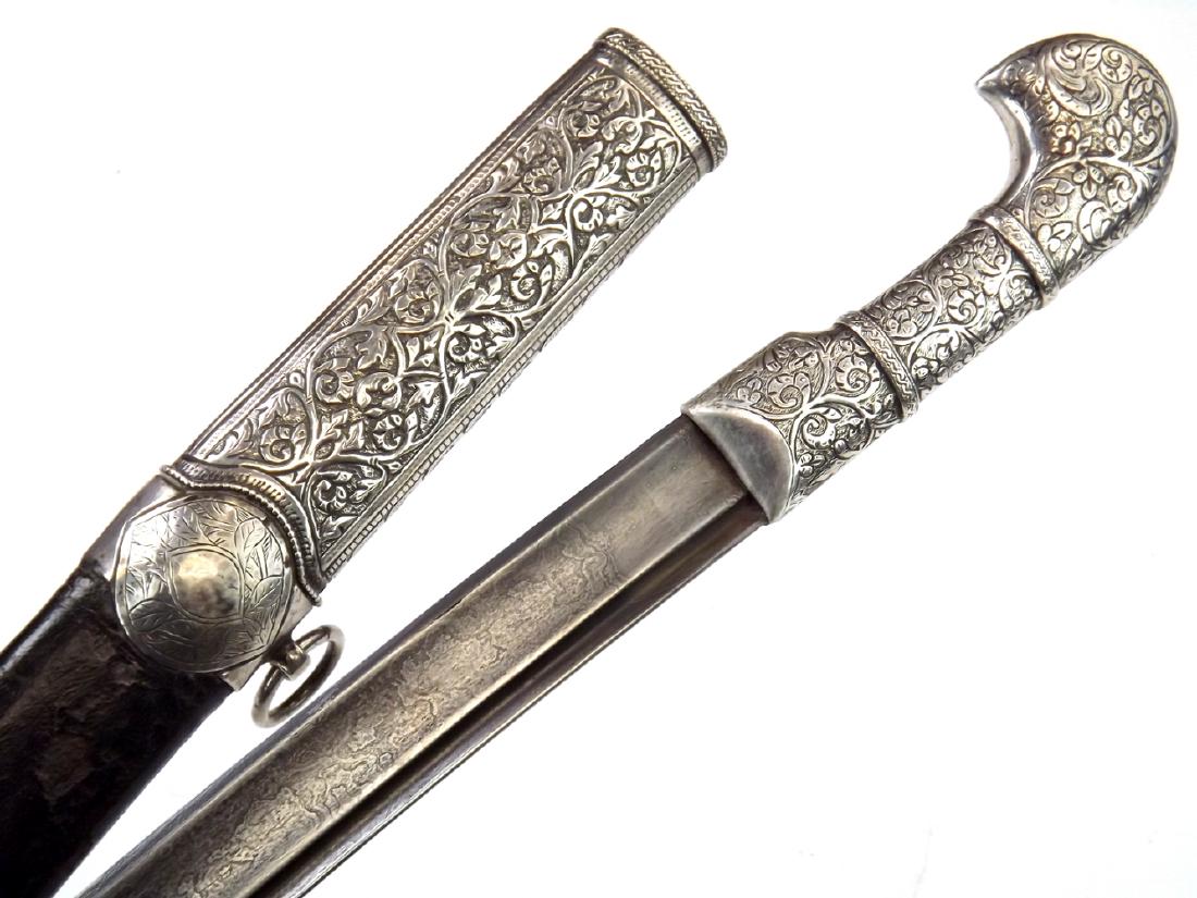 Nice Quality 18th - 19th C. Islamic Persian or Turkish: Nice Quality 18th - 19th C. Islamic Persian or Turkish Damascus Shashka Sword. A very nice quality example of either Turkish or Persian origin. In fine silver mounts carved with floral decorations. Ir