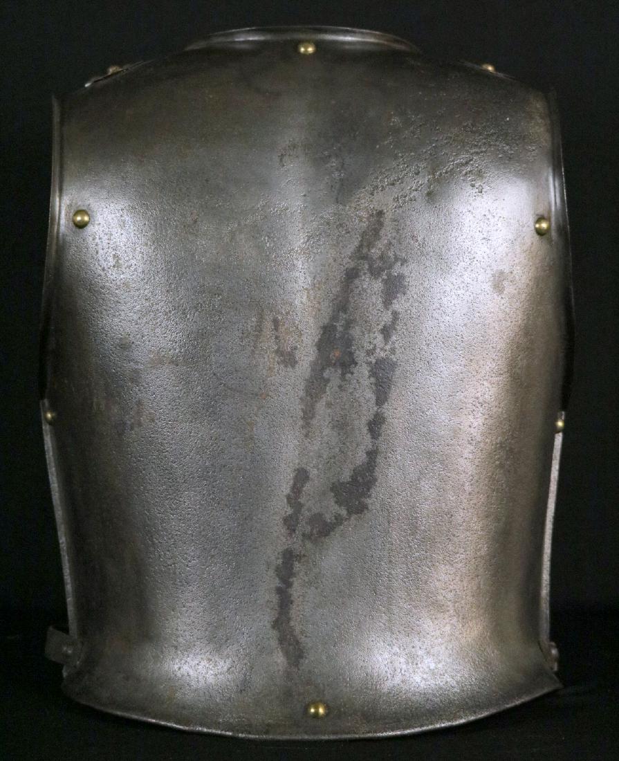 Very Large 19th C. Backplate for Cuirass Armor, French: Very Large 19th C. Backplate for Cuirass Armor, French or German. An exceptionally large backplate of an European cuirass worn by a soldier of much bigger than average proportions, measuring 20" in he