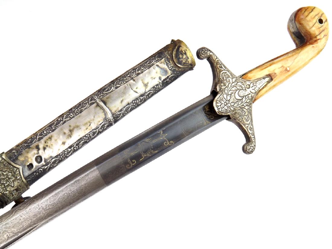 19th C. Islamic Ottoman Turkish Officer's SHAMSHIR: 19th C. Islamic Ottoman Turkish Officer's SHAMSHIR Sword with Damascus Blade. A very attractive example in gold gilt silver mounts each stamped with Tugra arsenal hallmarks. Bone grips of traditional 