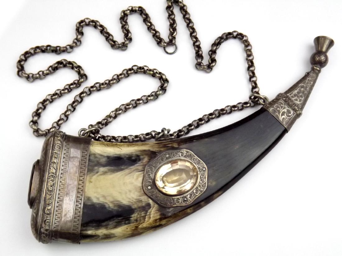 Beautiful 19th C. Scottish Silver Mounted and Jeweled: Beautiful 19th C. Scottish Silver Mounted and Jeweled Powder Horn Flask. A large and very attractive example made of a solid piece of multi-color bullhorn with fine silver mounts profusely chased with