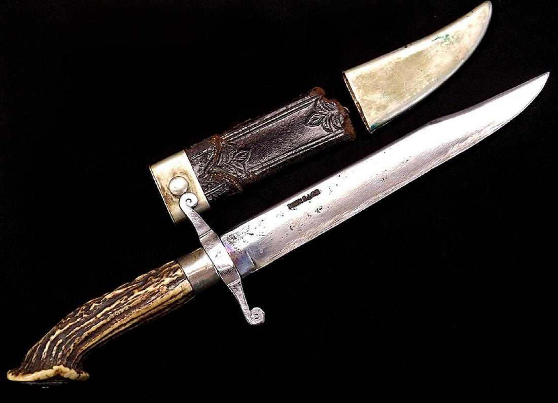 19th C. English Bowie Knife by "John S. Lon" owned by a: 19th C. English Bowie Knife by "John S. Lon" owned by a Mason Masonic. Nice size early English bowie knife with a large deer stag grip having silver furniture, pommel engraved with owner's initials an