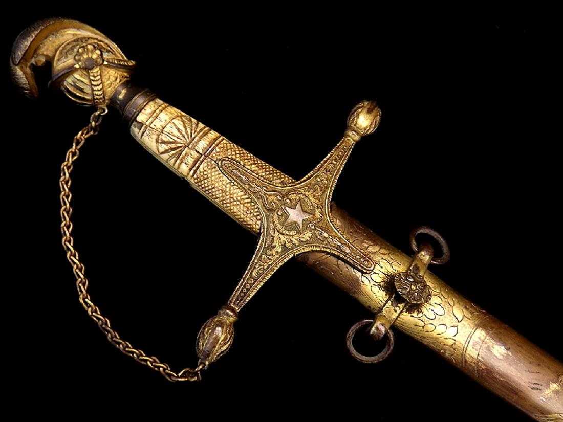 Model 1850 US Militia Officers Sword used in American: Model 1850 US Militia Officers Sword used in American Civil War. In its richly gilt brass mounts with Knights helmet pommel and other lovely details, carved bone one piece grip and chained knuckle bow