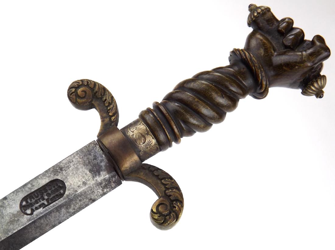 Unique 18th C. French Masonic Mason's Dagger with: Unique 18th C. French Masonic Mason's Dagger with Rubies in Fine Horn Grip. An outstanding quality dagger with an elaborate large grip carved of a solid piece of horn, in the form of the hand holding 