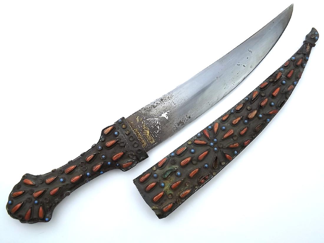 Rare 18th - 19th C. Ottoman Turkish or Greek TRAPEZUND: Rare 18th - 19th C. Ottoman Turkish or Greek TRAPEZUND Dagger with Corals and Turquoise Decorations. With its curved double-edged blade, having lightly worn Islamic calligraphy on both sides of ricass