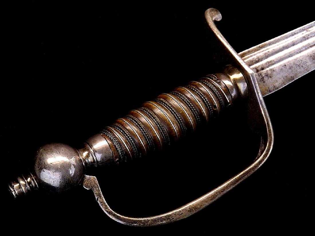 Rare and Very Attractive American Revolution Silver: Large battle saber most likely carried by an American Cavalry officer during the Revolutionary war era, with attractive silver hilt mounts and very fine bull horn grip inlaid with silver wire and boun