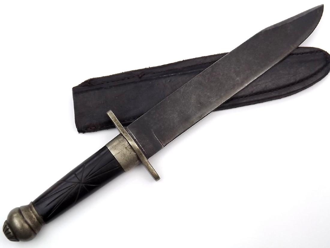 Circa 1840s-1860s American Civil War Era Fighting Bowie: Circa 1840s-1860s American Civil War Era Fighting Bowie Knife. In its German silver mounts with a buffalo horn grip carved with simple geometric design. With its large clip-point blade exhibiting heav