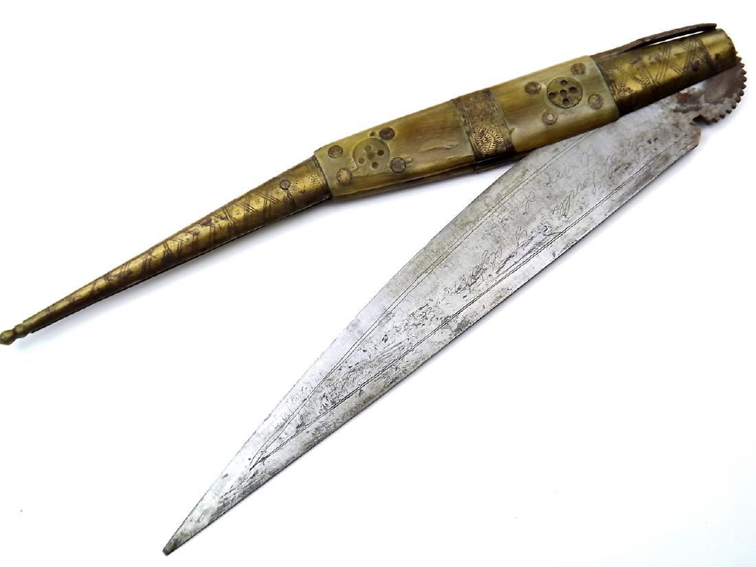 18th -19th C. Large Spanish NAVAJA folding Knife with: 18th -19th C. Large Spanish NAVAJA folding Knife with Inscribed Blade. In bullhorn and brass mounts with a large leafed blade having an extensive ratchet making a loud rattling noise when opens. Engra