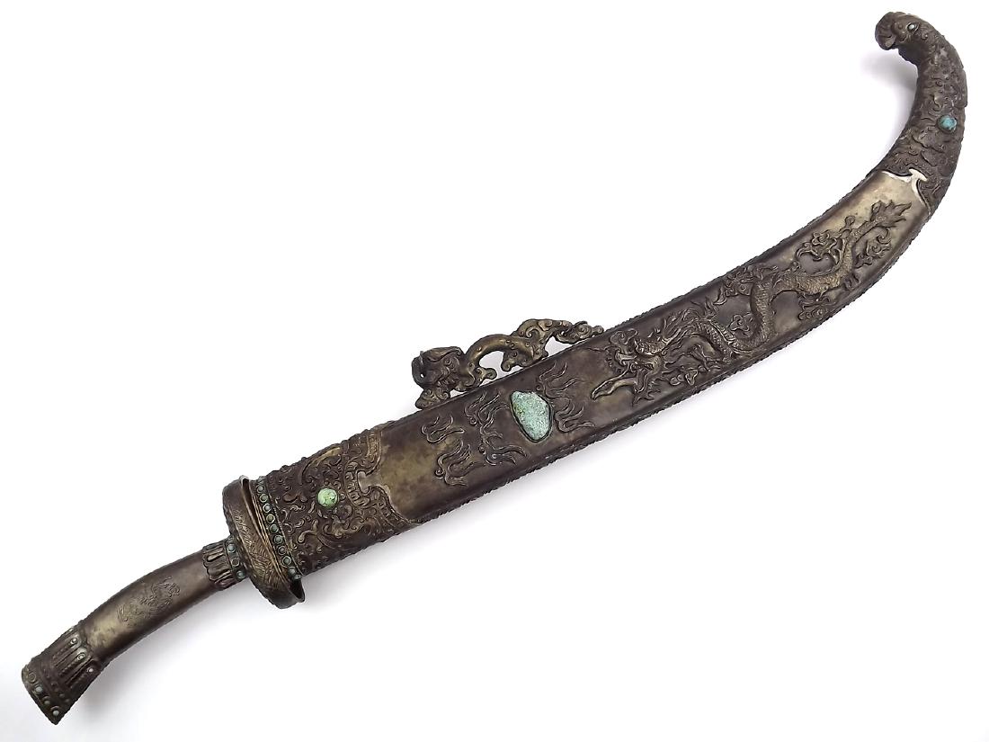 Very Large 19th C. Silver Mounted Chinese Mongolian: Very Large 19th C. Silver Mounted Chinese Mongolian Temple Sword . An exceptionally well sized and impressive example in its lower grade silver mounts having elaborate decorations with lovely dragons 