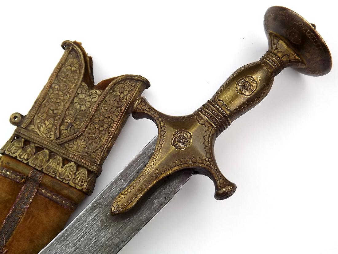 18th - 19th C. Indian Mughal SHAMSHIR TULWAR Sword with: 18th - 19th C. Indian Mughal SHAMSHIR TULWAR Sword with Damascus Blade. Nice Indian battle saber in its gold gilt copper mounts with a solid brass hilt of traditional form. Mounted with a large broad 