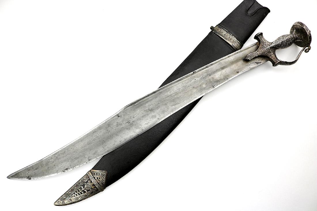Very Unusual 18th-19th C. Silver Mounted Indian: Very Unusual 18th-19th C. Silver Mounted Indian SOSUN-PATA Sword with Broad Damascus Blade. Total length (inside scabbard if present) : 30", Blade length : 23 1/2", Blade width : 2 5/8". Dear Bidders,