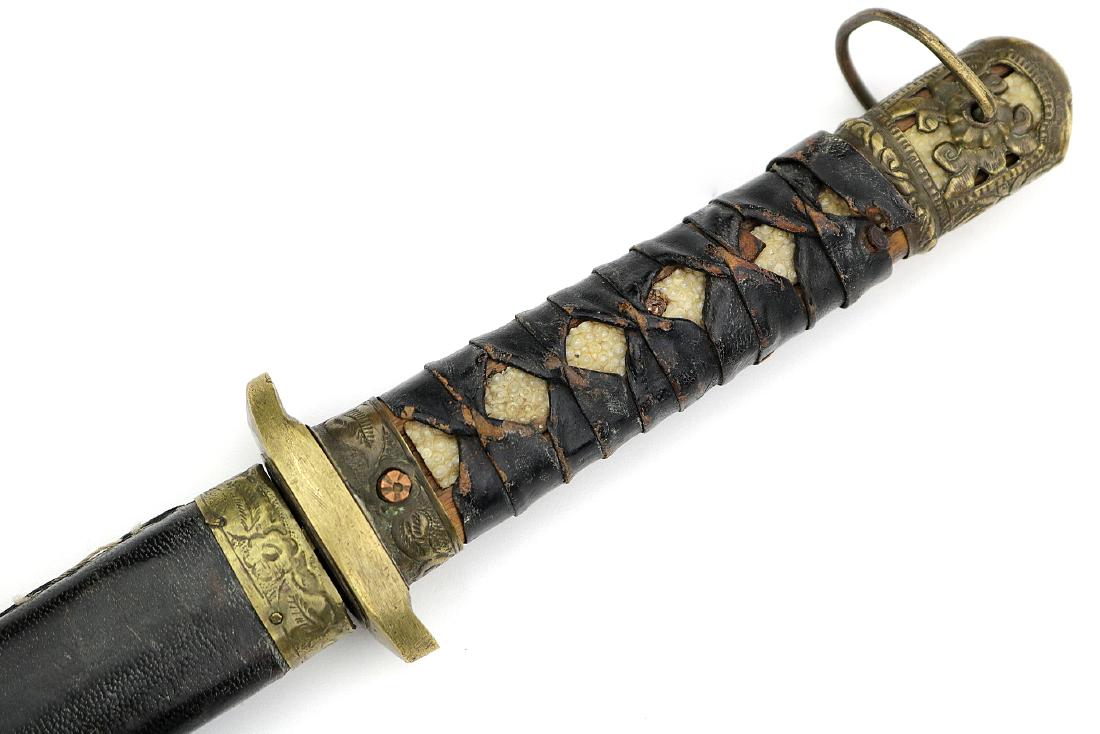 Rare 19th C. to WW I era Korean Army Officer's Dirk: Rare 19th C. to WW I era Korean Army Officer's Dirk Dagger in Brass & Stingray Skin Mounts. Total length (inside scabbard if present) : 20 1/2", Blade length : 12 1/2". Dear Bidders, please note, the 