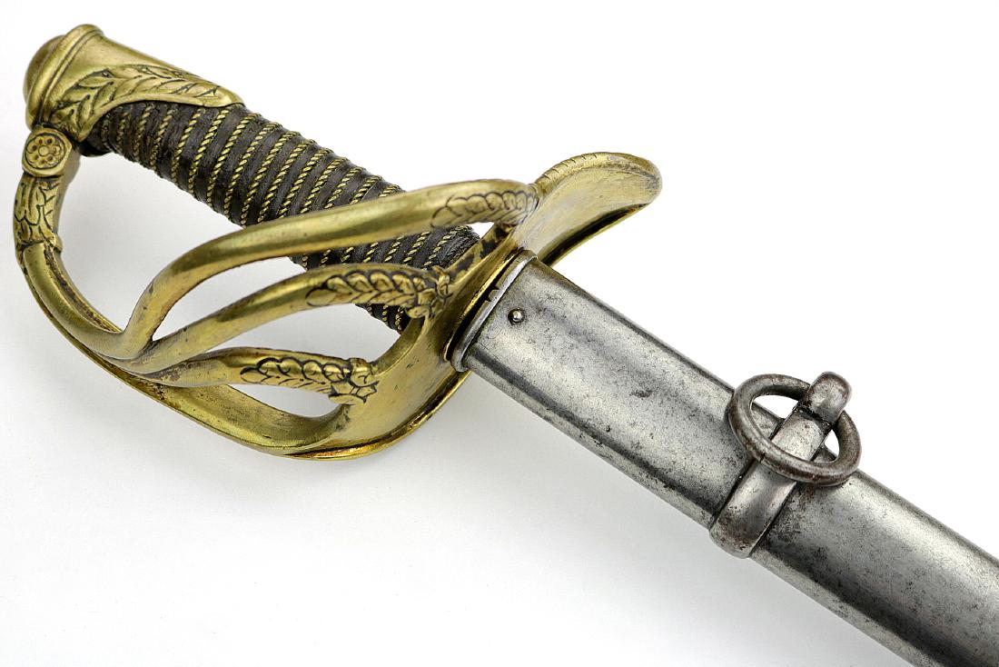 Large 19th C. French Cavalry Officer's Sword with: Large 19th C. French Cavalry Officer's Sword with Extra-Long Maker Marked Blade. Total Length (inside scabbard if present) - 46 1/4", Blade Length : 38 3/4". Provenance : Houston TX Private Collection