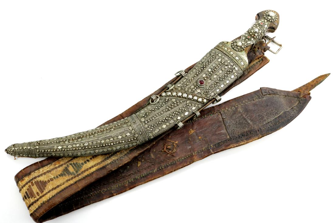 Good Quality 19th C. Silver Mounted Islamic Arabic Arab: Good Quality 19th C. Silver Mounted Islamic Arabic Arab JAMBIYA Dagger with Damascus Blade & Belt. Total Length (inside scabbard if present) - 20 1/2", Blade Length - 14 1/2"