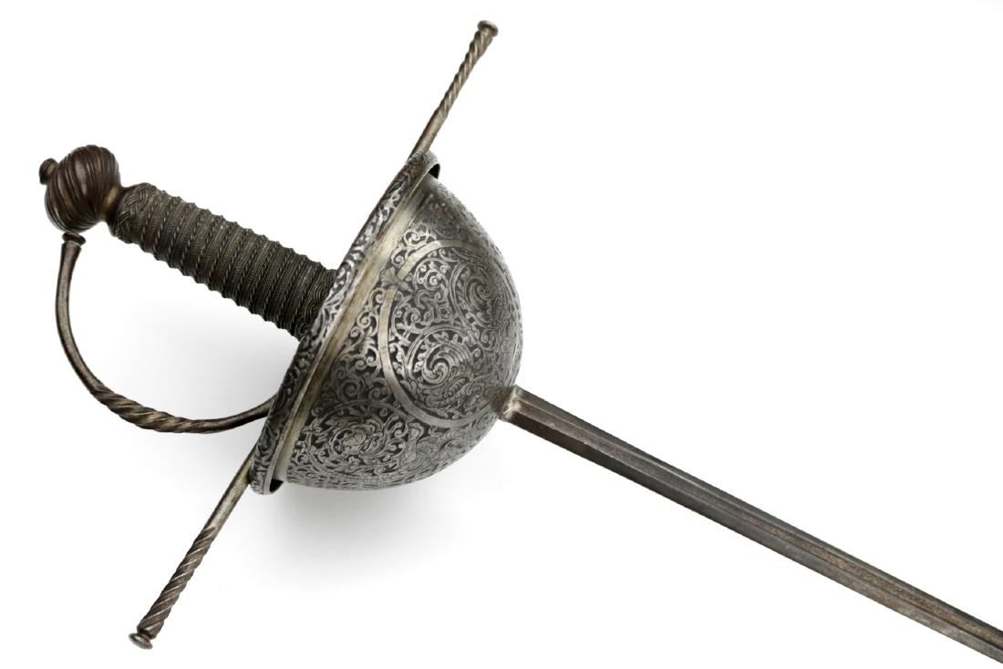Beautiful 17th-18th C. Spanish or Italian Cup-Hilt: Beautiful 17th-18th C. Spanish or Italian Cup-Hilt Rapier Sword with Fine Chiseled Steel Decorations. Total Length (inside scabbard if present) - 43". Blade Length - 36 1/2"