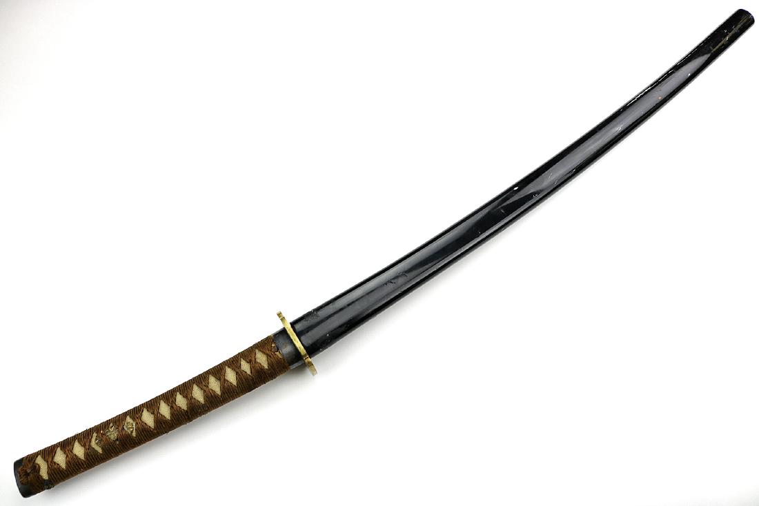 Very Powerful WW II era Japanese Officers KATANA Sword: Very Powerful WW II era Japanese Officers KATANA Sword with a Double Signed Blade. Total Length in Scabbard : 39 1/2", Blade Length (along the spine, from Habaki notch to the tip) : 25 3/4"