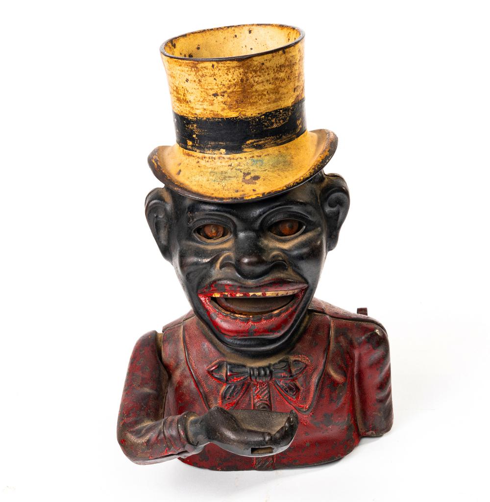 Cast Iron Jolly N with Top Hat Mechanical Bank: Cast Iron Jolly N with Top Hat Mechanical Bank.English. Manufactured by John Harper. Working. Unusual key-lock trap with key.