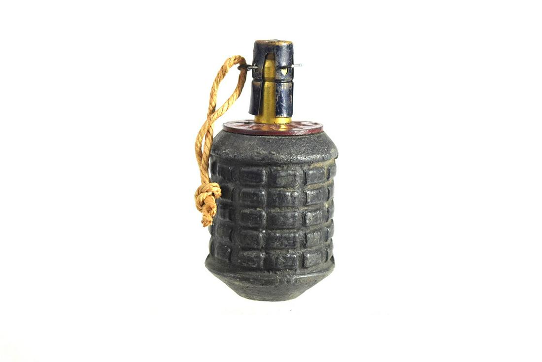 WWII Imperial Japanese Fragmentation M97 Type Grenade: WWII Imperial Japanese Fragmentation M97 Type Grenade. Standard-issue Japanese Type 97 hand grenade, 3 3/4" x 2" dia., used by the Imperial Japanese Army and the Special Naval Landing Forces with orig