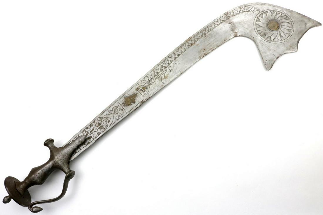 A 19th C. Indian Nepalese KORA Sword with Carved Steel: A 19th C. Indian Nepalese KORA Sword with Carved Steel Floral Decorations. Total Length (inside scabbard if present) : 27", Blade Length : 21 3/4"