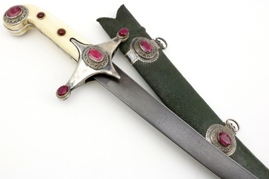 Fine Silver & Rubies mounted 18th-19th C. Persian or: Fine 18th-19th C. Persian or Turkish Shamshir Sword in Silver & Rubies mounts.Sword fit for a Prince, with solid silver mounts set with huge Rubies and fine grips in the Ottoman pistol-grip style. Dea
