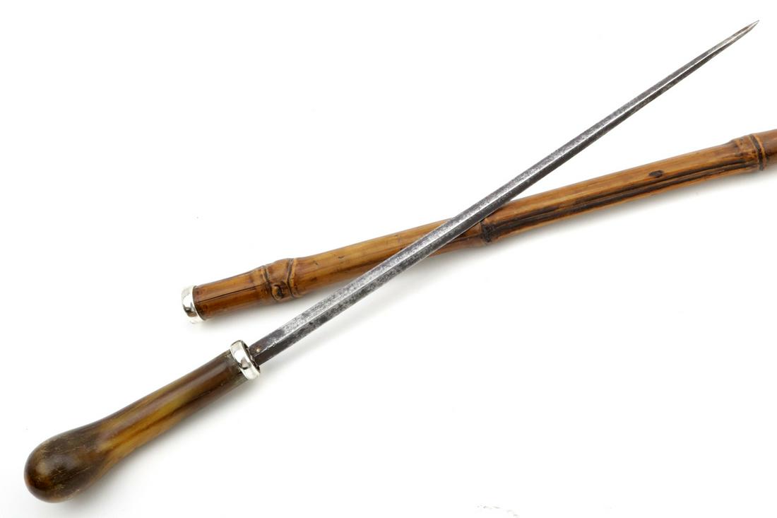 Antique 19th C. Continental Sword Cane.: Antique 19th C. Continental Sword Cane, mounted with a Long Stiletto Dagger Blade, Horn Grip and Silver mounts. Total length (inside scabbard if present) : 32 1/4"Blade length : 11 1/2"