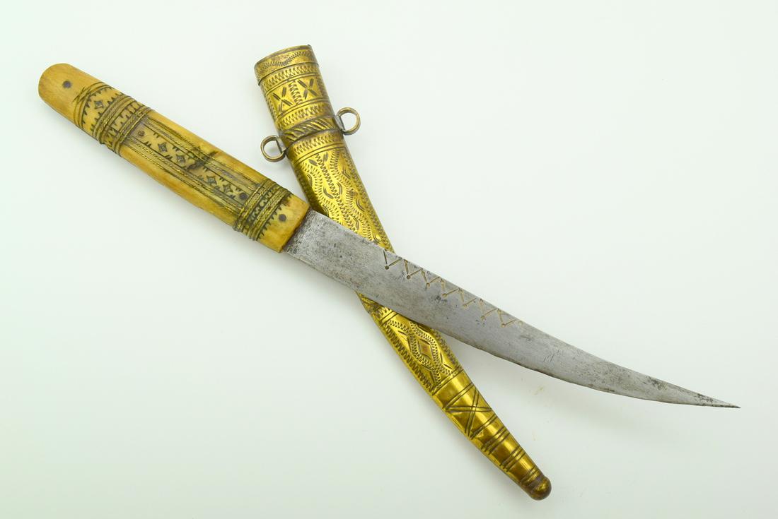 A North African 19th C. Islamic Arabic Jambiya Dagger: A North African 19th C. Islamic Arabic Jambiya Dagger with Horn Grip. Total length (inside scabbard if present) : 14 1/2"Blade length : 7 3/4"