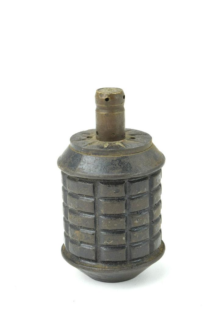 WWII Imperial Japanese Fragmentation M97 Type Grenade: WWII Imperial Japanese Fragmentation M97 Type Grenade. Standard-issue Japanese Type 97 hand grenade, 3 3/4" x 2" dia., used by the Imperial Japanese Army and the Special Naval Landing Forces with orig
