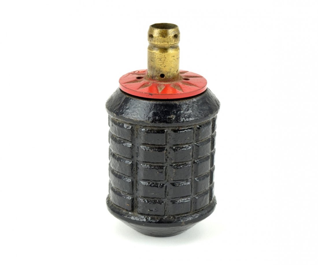 WWII Imperial Japanese Fragmentation M97 Type Grenade: WWII Imperial Japanese Fragmentation M97 Type Grenade. Standard-issue Japanese Type 97 hand grenade, 3 3/4" x 2" dia., used by the Imperial Japanese Army and the Special Naval Landing Forces with orig