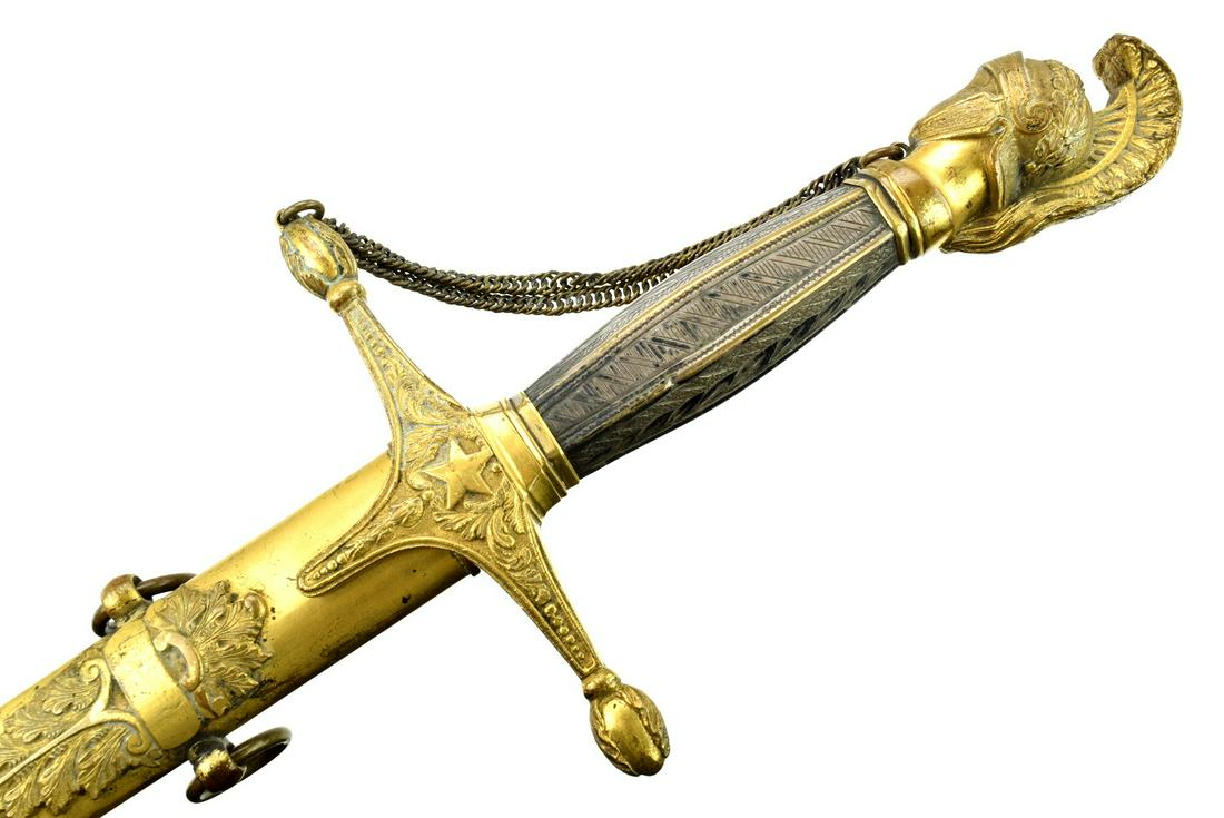 Civil War Peterson's Militia Staff Officer Type Sword: Rare crested helmet pommel Civil War Peterson's Militia Staff Officer Type Sword. Circa 1840-1860s. silvered grip, chain guard. Etched Ames address on blade with floral, military and patriotic motifs.