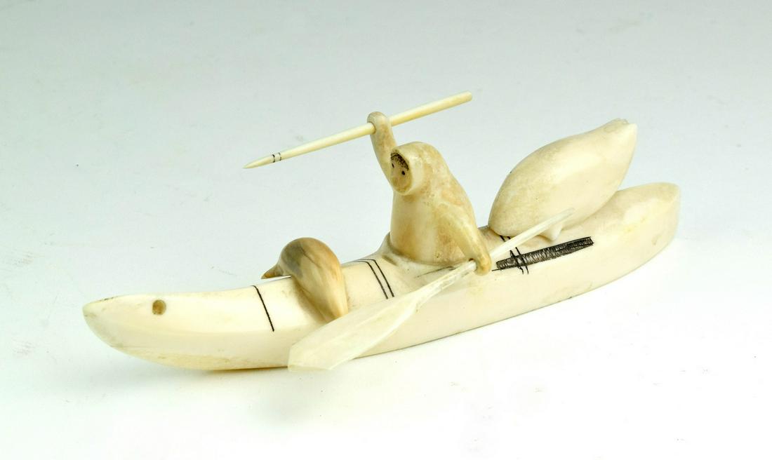 Paul Nattanguk Eskimo Inuit Walrus Tusk Carving: Authentic Eskimo Alaska vintage walrus tusk carved Eskimo boat with seals by Paul Nattanguk. Artist signed.Carving is 6 1/2" x 1 3/4".