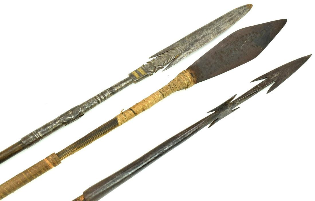 Lot of 3 Tribal Hunting & Fishing Spears, African or: Lot of 3 Tribal Hunting & Fishing Spears, African or South-East Asian, all 19th century, two with wood and one with bamboo shafts, all with strong iron or steel heads.Longest one is 56 3/4".