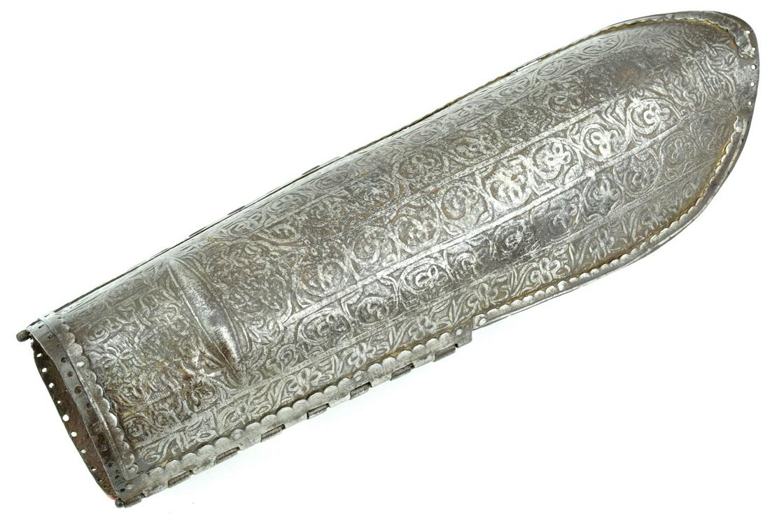Early 17th-18th C. Islamic Indian or Persian BAZU-BAND: Early 17th-18th C. Islamic Indian or Persian BAZU-BAND Sword-Arm Armor. Wrought of two strong steel plates and adorned with extensive engraved decorations of floral nature. Holes around the rim for a 