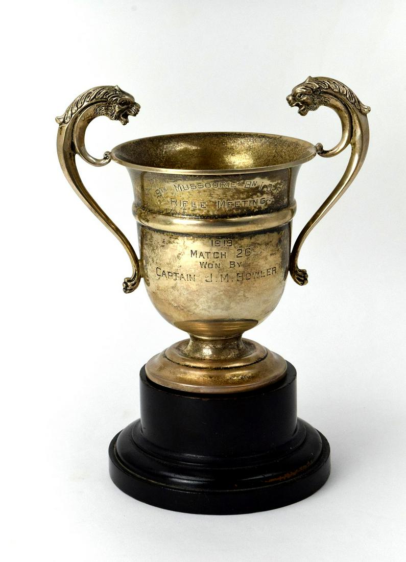 1919 Sterling Silver Rifle Meeting Trophy Cup Named: Antique 1919 sterling silver two handle " Rifle Meeting" two handle trophy cup presented to Captain J.M.Bowler who served in India. Comes with the original photograph of the Captain J.M.Bowler with hi