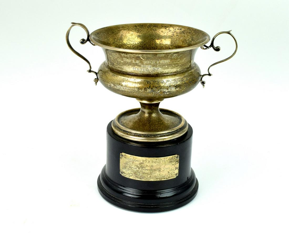 1919 Sterling Silver Rifle Meeting Trophy Cup Named: Antique 1919 sterling silver two handle " Rifle Meeting" two handle trophy cup presented to Captain J.M.Bowler who served in India. Comes with copy of the original photograph of the Captain J.M.Bowler